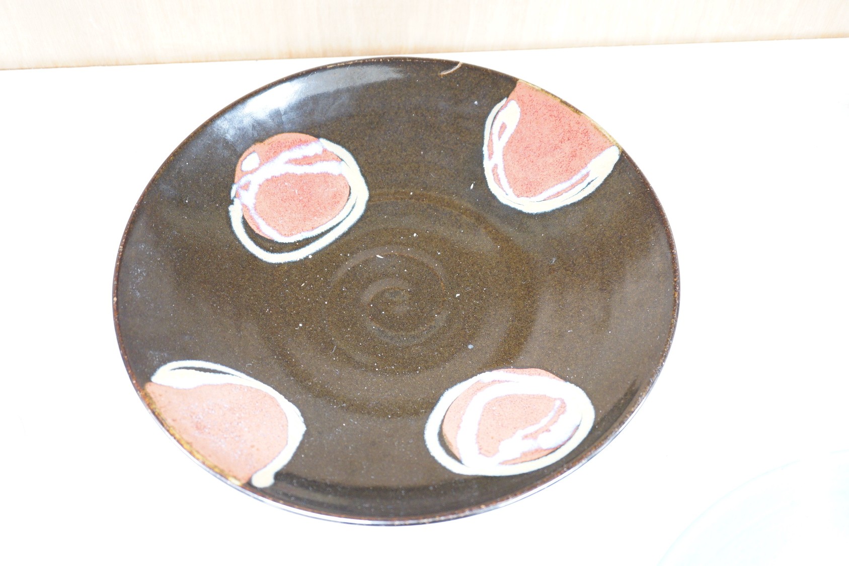 Five Studio pottery dishes, to include a John Harlow frog bowl, Marianne de Trey dish, David Melville dish, Tony Gants bowl, and another decorative painted dish, largest 35cm diameter